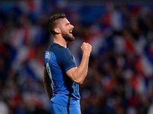 Giroud nets treble in France rout
