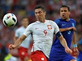 Robert Lewandowski and Jeffrey Bruma in action during the international friendly between Poland and The Netherlands on June 1, 2016