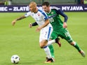 Slovakia's Vladimir Weiss (L) and Northern Ireland's Kyle Lafferty (R) vie for a ball during the a UEFA EURO 2016 friendly football match between Slovakia and Northern Ireland in Trnava, on June 4, 2016