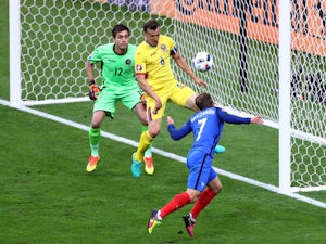 Antoine Griezmann of France heads the ball hitting a post during the UEFA Euro 2016 Group A match between France and Romania at Stade de France on June 10, 2016 in Paris, France