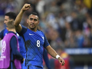 Payet stunner rescues win for France