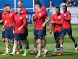 England's players run during a training session at their training ground in Chantilly, on June 7, 2016