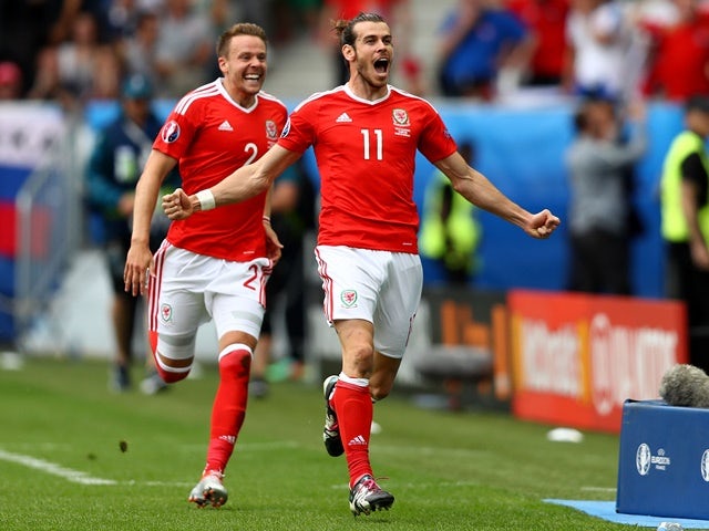 Gareth Bale celebrates scoring Wales's first goal against Slovakia at Euro 2016 on June 11, 2016