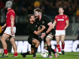 Kieran Read of New Zealand celebrates after scoring a try with teammate Aaron Cruden during the international Test against Wales on June 11, 2016