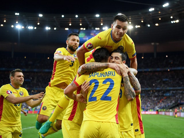 Bogdan Stancu (1st R) of Romania celebrates scoring his team's first goal with his team mates during the UEFA Euro 2016 Group A match between France and Romania at Stade de France on June 10, 2016 in Paris, France