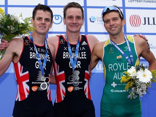 Alistair Brownlee and Jonathan Brownlee of Great Britain and Aaron Royale of Australia pose during the 2016 ITU World Triathlon Leeds on June 12, 2016