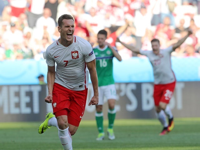 Poland's forward Arkadiusz Milik celebrates his goal during the Euro 2016 Group C match against Northern Ireland on June 12, 2016