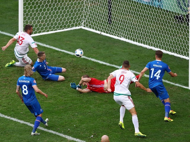 Birkir Saevarsson of Iceland scores an own goal against Hungary on June 18, 2016