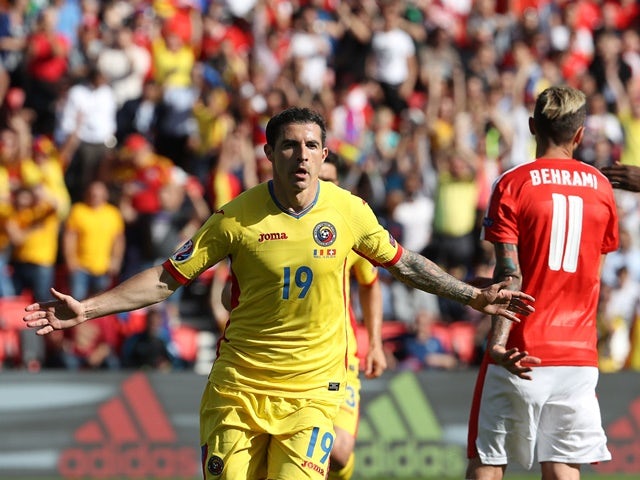 Bogdan Stancu celebrates scoring a penalty during the Euro 2016 Group A game between Romania and Switzerland on June 15, 2016
