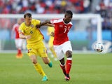 Breel Embolo and Vlad Chiriches in action during the Euro 2016 Group A game between Romania and Switzerland on June 15, 2016