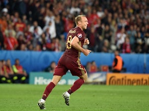 Denis Glushakov celebrates scoring during the Euro 2016 Group B game between Russia and Slovakia on June 15, 2016