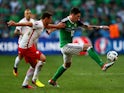 Grzegorz Krychowiak and Kyle Lafferty in action during the Euro 2016 Group C game between Poland and Northern Ireland on June 12, 2016