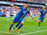 Gylfi Sigurdsson celebrates after scoring during the Euro 2016 Group F match between Iceland and Hungary on July 18, 2016