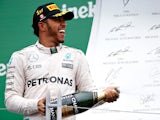 Lewis Hamilton of Mercedes celebrates his win on the podium during the Canadian Formula One Grand Prix at Circuit Gilles Villeneuve on June 12, 2016