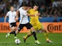 Mesut Ozil vies with Artem Fedetskiy during the Euro 2016 Group C match between Germany and Ukraine on June 12, 2016