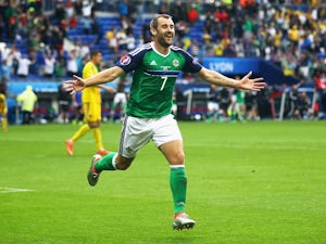 Northern Ireland keep hopes alive with win