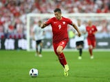 Robert Lewandowski of Poland runs with the ball during the Euro 2016 Group C match against Germany on June 16, 2016