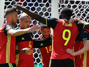 Hazard stars as Belgium reach last eight
