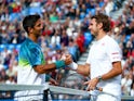 Fernando Verdasco shakes hands with Stanislas Wawrinka after his victory in their first-round match at Queen's on June 14, 2016