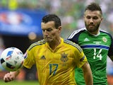 Stuart Dallas and Artem Fedetskiy during the Euro 2016 Group C match between Ukraine and Northern Ireland on July 16, 2016