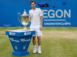 Andy Murray with the trophy after victory in the final against Milos Raonic at Queen's on June 19, 2016