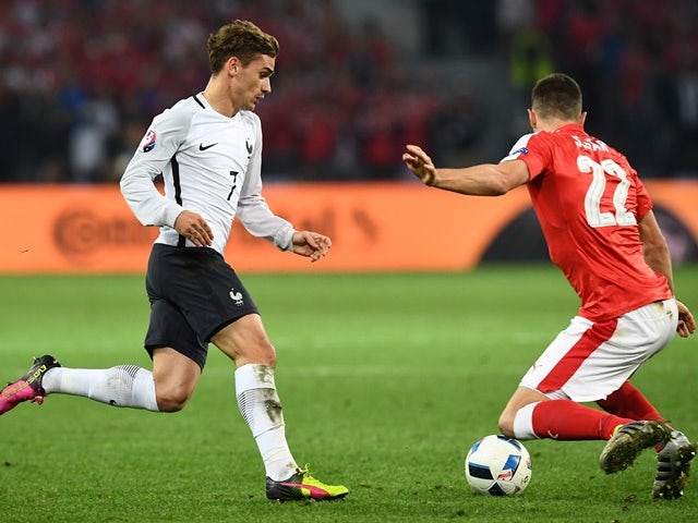 Antoine Griezmann and Fabian Schaer in action during the Euro 2016 Group A match between Switzerland and France on June 19, 2016