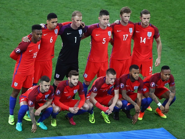 England players line up ahead of the Euro 2016 Group B match against Slovakia on June 20, 2016