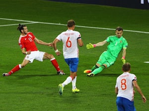 Gareth Bale scores his side's third goal during the Euro 2016 Group B match between Russia and Wales on June 20, 2016