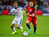 Jack Wilshere and Peter Pekarik compete for the ball during the Euro 2016 Group B match between Slovakia and England on June 20, 2016