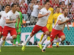 Poland edge past Ukraine to finish second in Group C