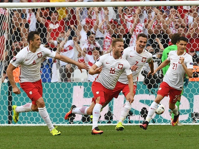 Jakub Blaszczykowski scores during the Euro 2016 Group C match between Ukraine and Poland on June 21, 2016
