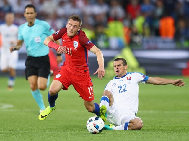Viktor Pecovsky fouls Jamie Vardy to earn a yellow card during the Euro 2016 Group B match between Slovakia and England on June 20, 2016