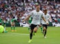 Mario Gomez celebrates scoring the opening goal during the Euro 2016 Group C match between Northern Ireland and Germany on June 21, 2016