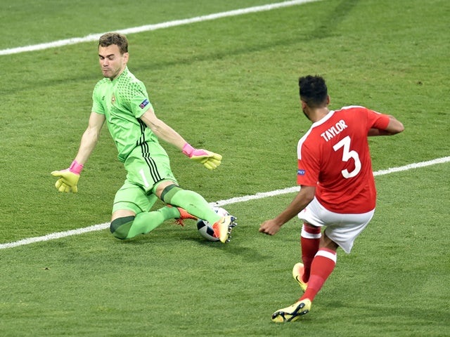 Neil Taylor scores Wales's second during the Euro 2016 Group B match against Russia on June 20, 2016