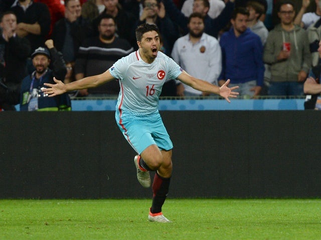 Ozan Tufan celebrates after scoring a goal during the Euro 2016 Group D match between Czech Republic and Turkey on June 21, 2016