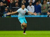 Ozan Tufan celebrates after scoring a goal during the Euro 2016 Group D match between Czech Republic and Turkey on June 21, 2016