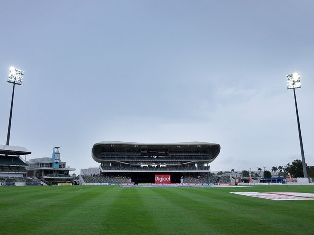 Rain interrupts the play of the seventh ODI of the Tri-nation Series between Australia and South Africa in Bridgetown on June 19, 2016