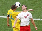 Ruslan Rotan and Grzegorz Krychowiak in action during the Euro 2016 Group C match between Ukraine and Poland on June 21, 2016
