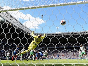 Darren Randolph dives in vain as Antoine Griezmann scores his second goal during the Euro 2016 RO16 match between France and Republic of Ireland on June 26, 2016