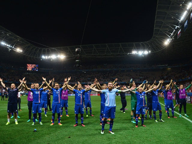 Iceland players celebrate their team's 2-1 win in the UEFA EURO 2016 round of 16 match between England and Iceland at Allianz Riviera Stadium on June 27, 2016 in Nice, France