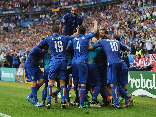 Italy players celebrate their team's second goal by Graziano Pelle (obscured) during the UEFA EURO 2016 round of 16 match between Italy and Spain at Stade de France on June 27, 2016 in Paris, France