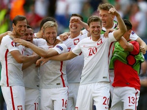Poland reach last eight on penalties