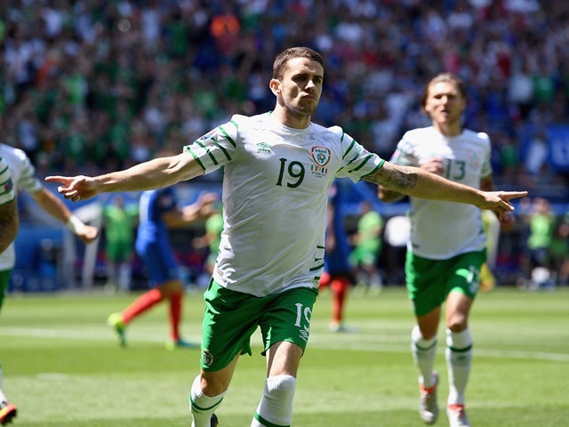 Robbie Brady celebrates scoring the opening goal during the Euro 2016 RO16 match between France and Republic of Ireland on June 26, 2016