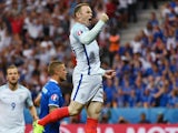 Wayne Rooney of England celebrates scoring the opening goal during the UEFA EURO 2016 round of 16 match between England and Iceland at Allianz Riviera Stadium on June 27, 2016 in Nice, France