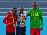 Mo Farah poses with his gold medal after the men's 10,000m at the Rio Olympics on August 13, 2016