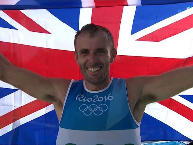 Nick Dempsey celebrates winning Olympic silver in Rio on August 14, 2016