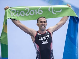 Lewis wins historic triathlon gold