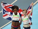 Kadeena Cox and Sophie Hahn pose with the British flag after taking silver and gold in the women's T38 100 final at the Rio Paralympics on September 9, 2016