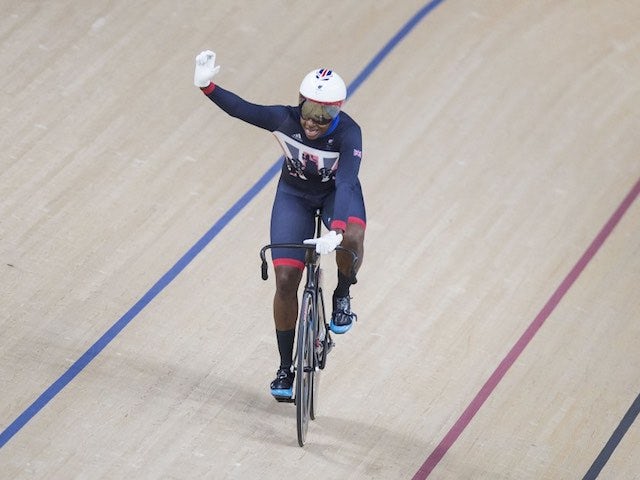 Kadeena Cox celebrates winning gold in the women's C4-5 500m time trial at the Paralympic Games in Rio de Janeiro on September 10, 2016