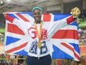 Kadeena Cox poses with her gold medal and the GB flag after winning the women's C4-5 500m time trial at the Paralympic Games in Rio de Janeiro on September 10, 2016